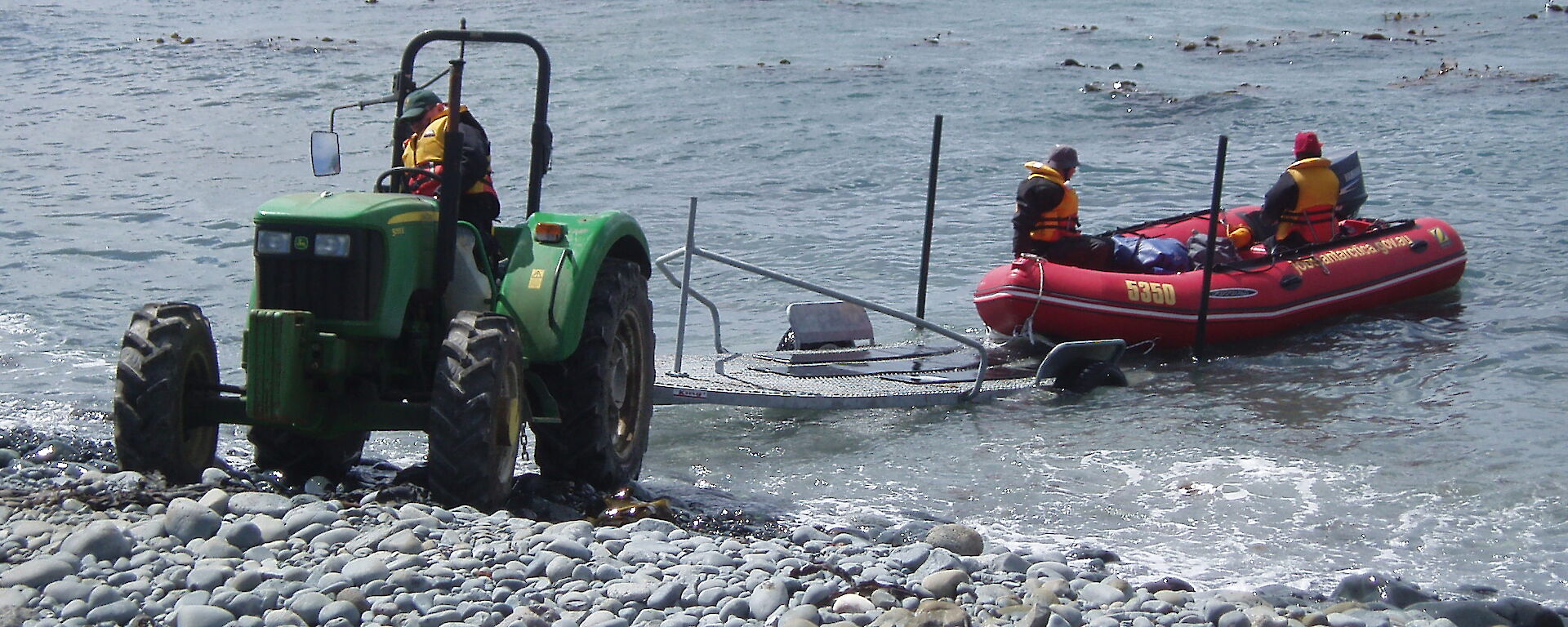 Launching a Zodiac IRB by tractor