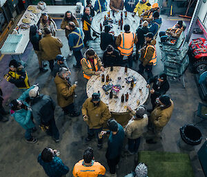 Large group of people at a BBQ in the operations building