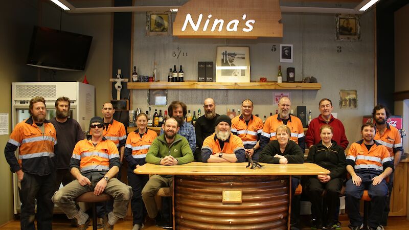 Group shot of expeditioners relaxing in the bar