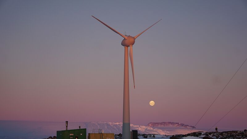 Wind turbine with full moon behind