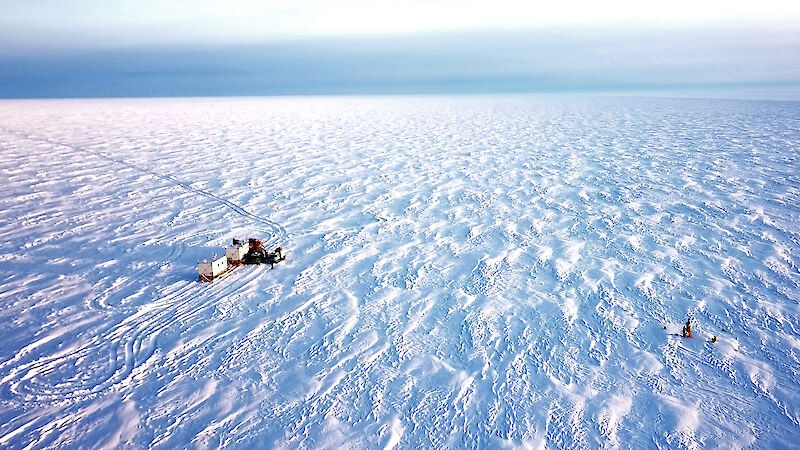 Aerial view of traverse vehicles on the ice sheet