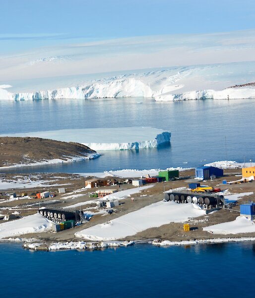 Aerial view of Mawson station and East Bay with ice sheet on clear bright day