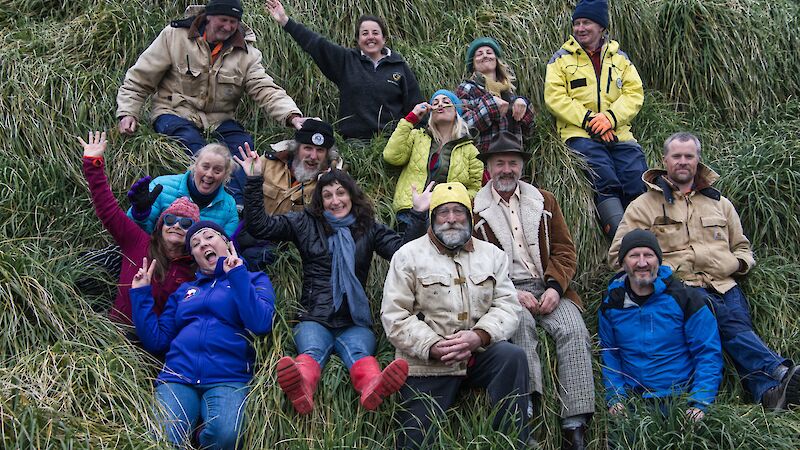A group of expeditioners in long grass