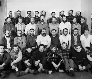 black and white group photo of Casey wintering expeditioners 1969