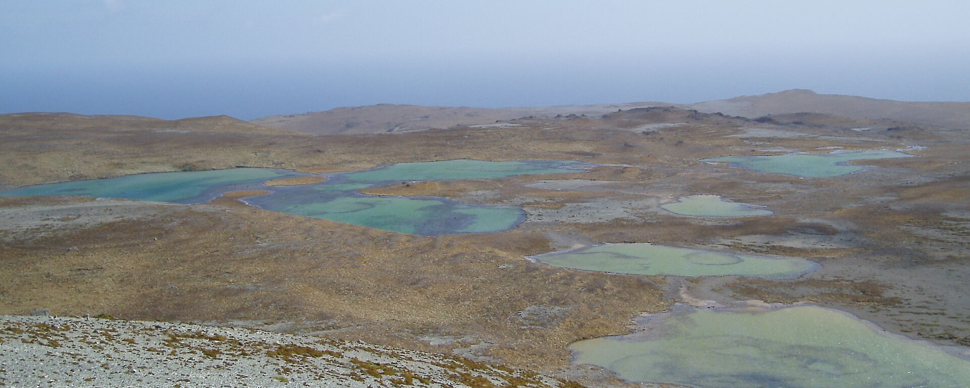 A group of small lakes on a barren plateau