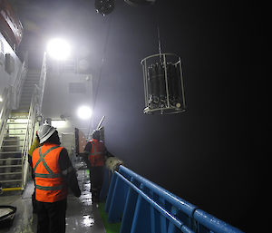 water sampling from the ship at night