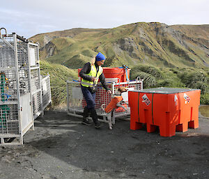 Woman and dog check containers