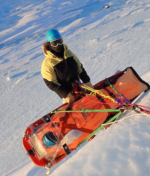 Stretcher on ice cliff