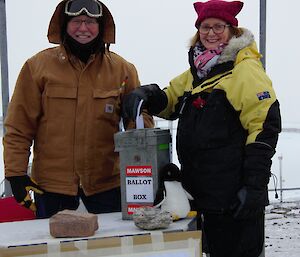 two people with ballot box