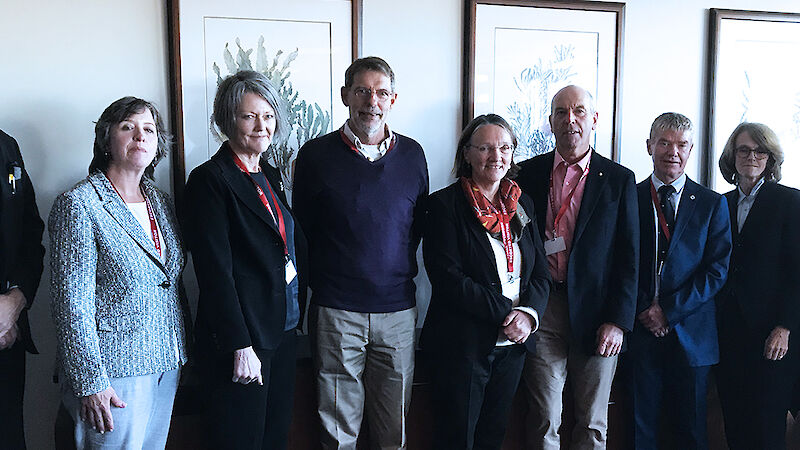 New Australian Antarctic Science Council group photo of 9 people