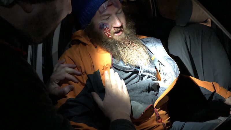 Doctors attend to a simulated car crash victim in a scenario at Arm River in Tasmania