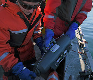 Dr Petrou collects surface water samples from Prydz Bay, East Antarctica.