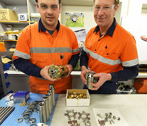 Australian Antarctic Division’s Senior Technical Officer, Chris Richards, and Instrument Workshop Manager, Steve Whiteside with ice core drill parts