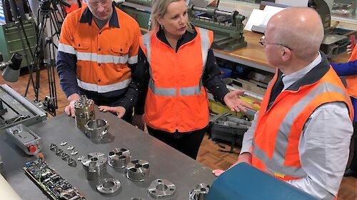 Minister for the Environment, the Hon Sussan Ley MP, inspecting the completed ice core drill components