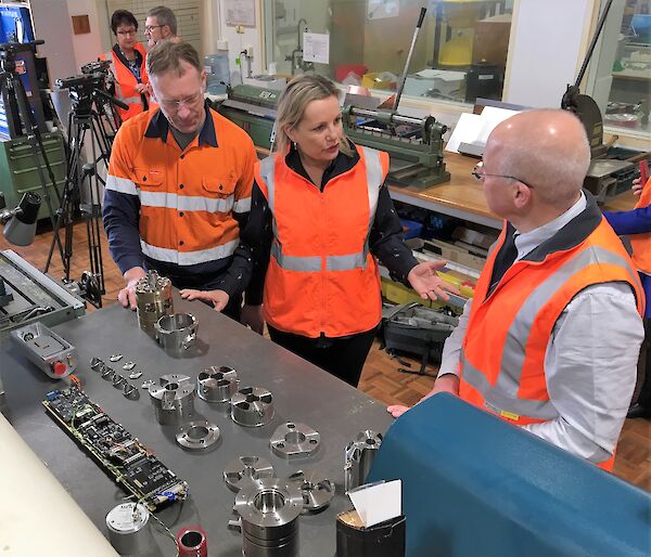 Minister for the Environment, the Hon Sussan Ley MP, inspecting the completed ice core drill components