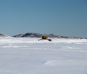 Snow groomer on the sea-ice