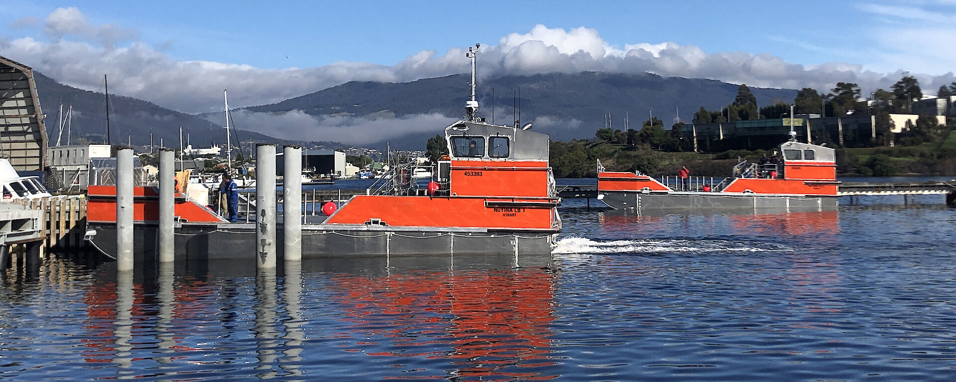 The two Antarctic barges on the River Derwent