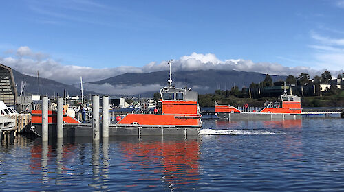 The two Antarctic barges on the River Derwent