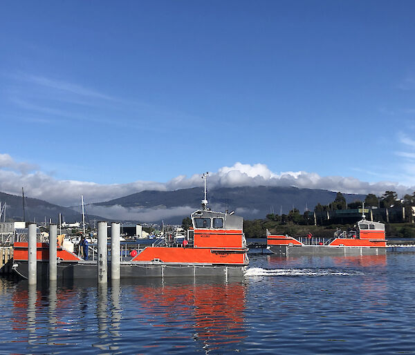 The two Antarctic barges on the River Derwent