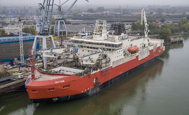 The Nuyina docked by a wharf in Romania.