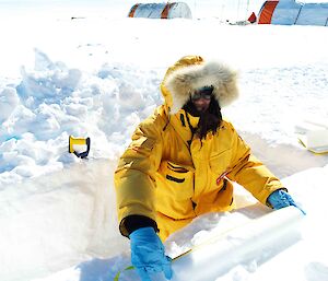 Scientist processing an ice core in Antarctica