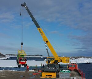 New Fire Hagg mbeing offloaded by crane onto wharf