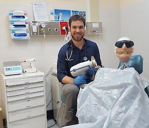 Rob in the dental suite with another smiling customer – this time ‘Yorick’ the dental training mannequin