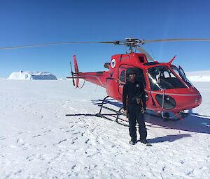 Helicopter on sea ice near Chick Island, 250nm East of Casey Station