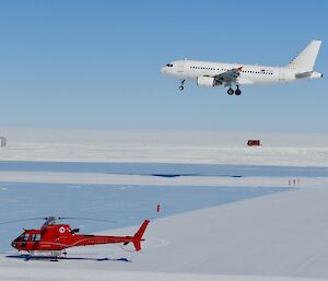 First end of season aircraft, the Airbus A19, arriving into Wilkins Aerodrome with helicopter in the foreground