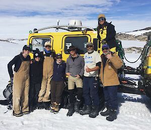 Team Remediation & Seabird (Phoebe, Louise, Colin, Lauren, Robbie, Johan, Anne & Gavin) standing in front of the yellow hagg