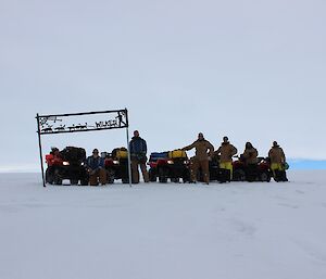 Six expeditioners and their quads heading to Wilkes