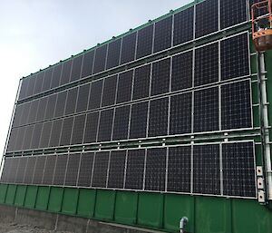 The solar panels of the red shed