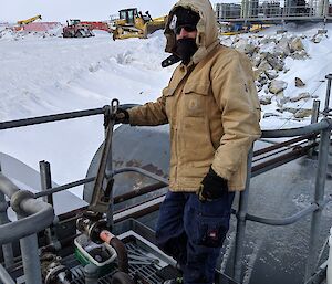 Dean changing gaskets at the fuel farm