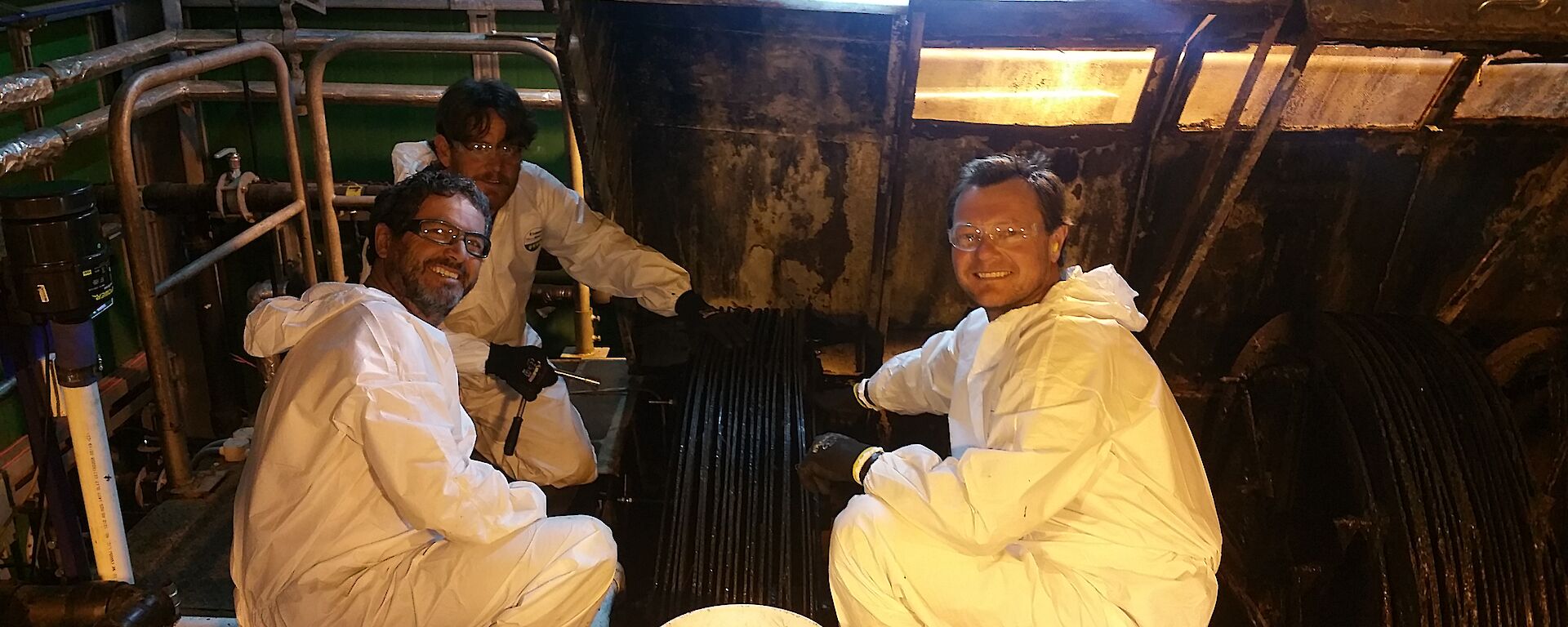 Three plumbers working on the ‘choccie wheels'