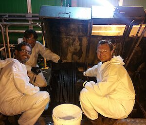 Three plumbers working on the ‘choccie wheels'