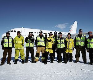 The wilkins team standing in front of the irbus before its departure