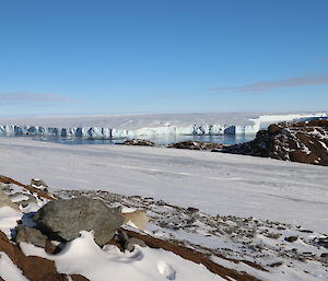 The Vanderford Glacier with snow ice and ocean in the foreground