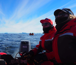 Aaron on an Iceberg cruise with iceberg and another boat in the background