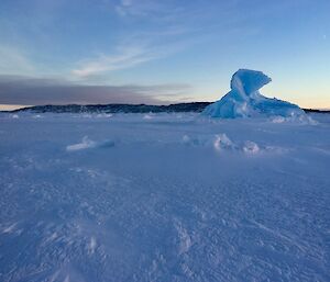 Looking across the ice at Shirley Island with an iceberg in the foreground