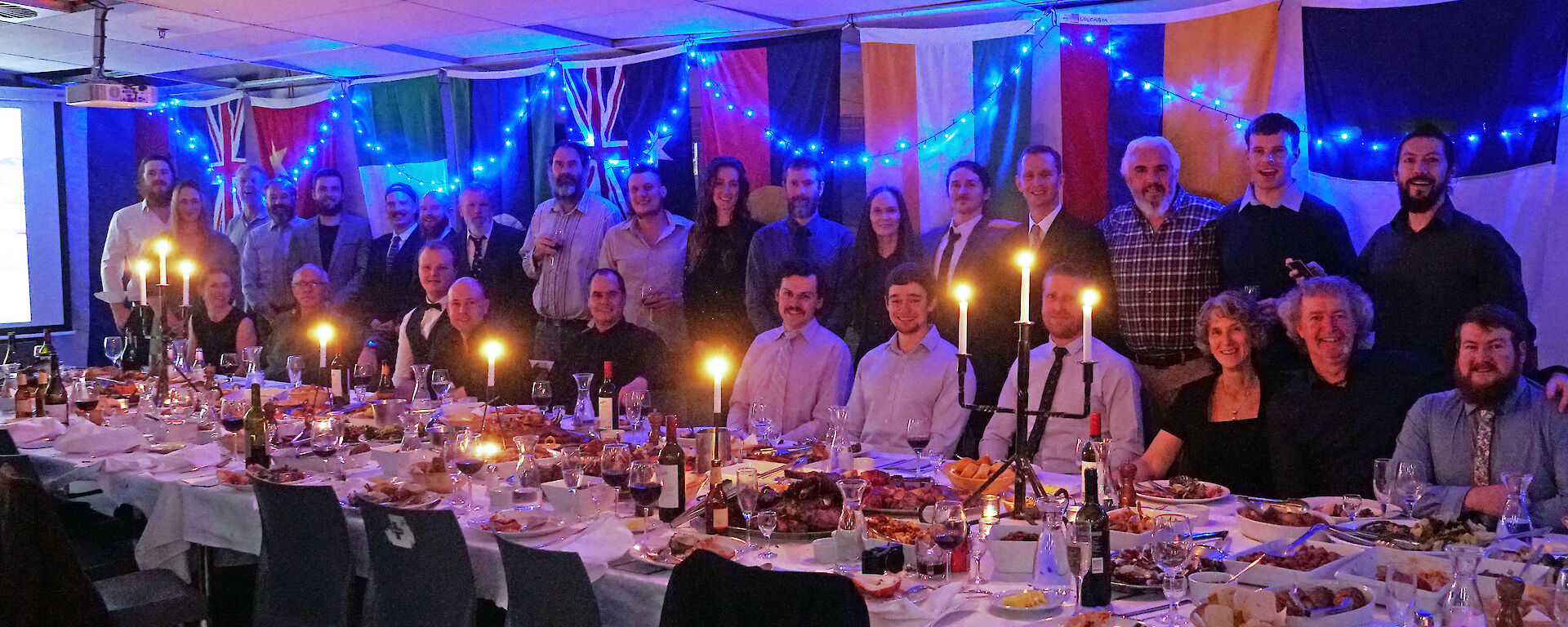 Casey’s 72nd ANARE Midwinter Dinner with the team of 29 behind the table