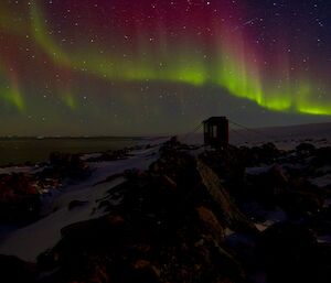 An aurora of red and green over the toilet at Jack’s Donga