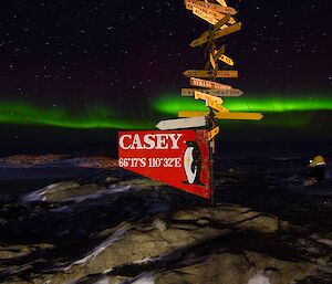 A green aurora behind the Casey sign