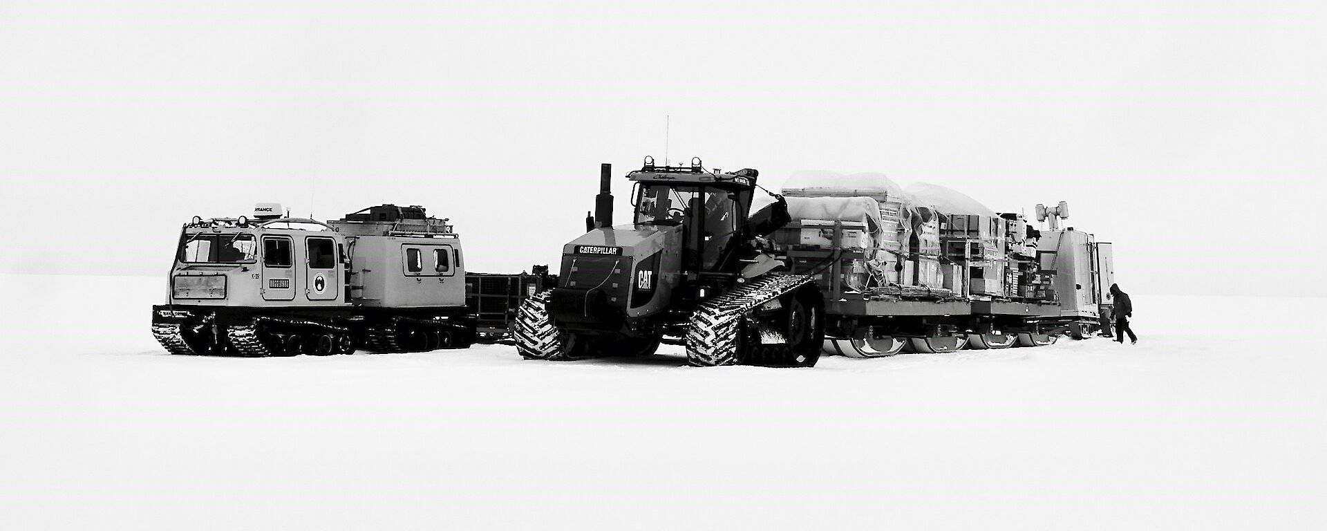 A Hagg and Challenger Tractor pulling a load on sleds to Law Dome