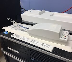 The RS41 Radiosonde sitting inside. The temperature and humidity sensors are on the left. The transmission aerial is on the right