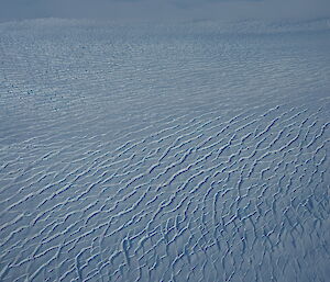 A picture showing a ice field of crevasses