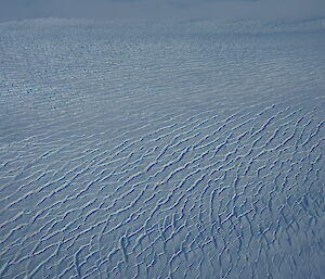 A picture showing a ice field of crevasses