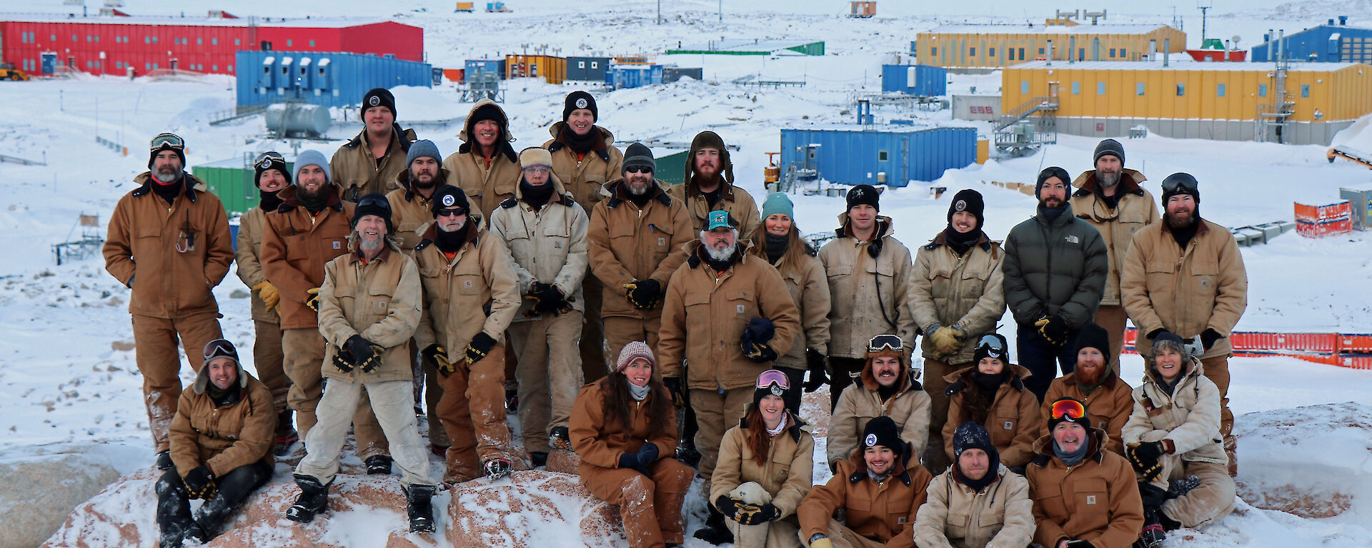 The Casey winter team standing on Reeve’s Hill with Sttion in Background