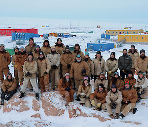 The Casey winter team standing on Reeve’s Hill with Sttion in Background