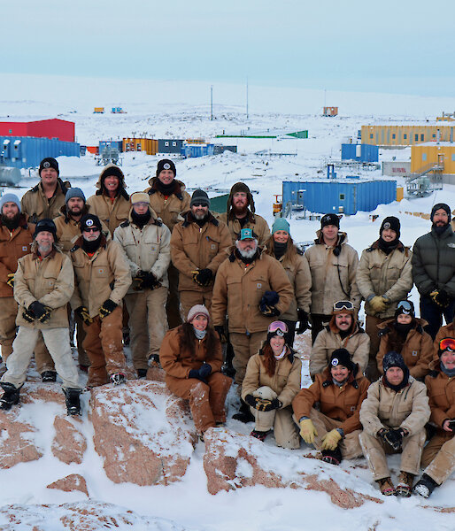 The Casey winter team standing on Reeve’s Hill with Sttion in Background