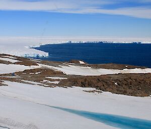 An ariel view of the Browning’s hut with the Vanderford Glacier and bay in the background